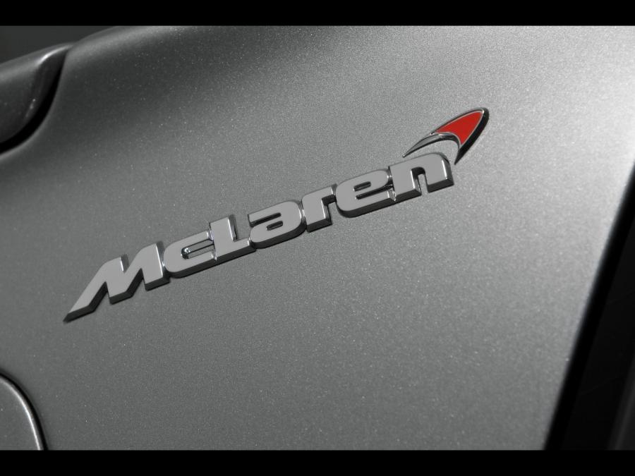 Логотип Mercedes-Benz SLR McLaren 722S Roadster (R199) 2008 года  (фото 25 из 26)